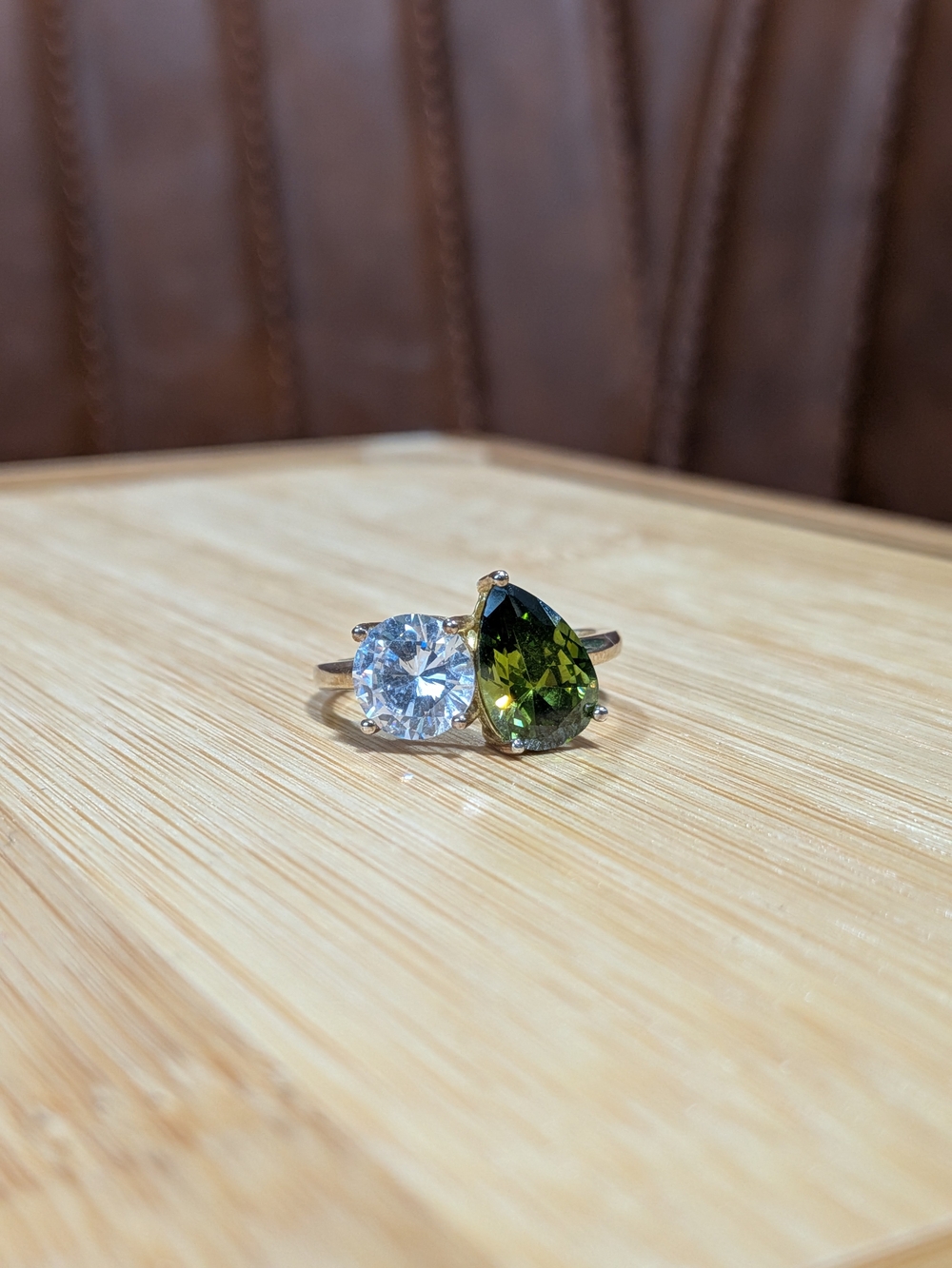 Double Stone Ring with Green Teardrop and Clear Round Gem